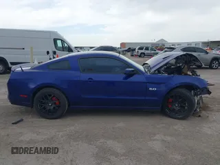2013 Ford Mustang GT with VIN 1ZVBP8CF9D5236090, listed as a IAAI auction lot 41763178 with 106,027 mi miles and . Bid and sale history available at DreamBid. Image 12.