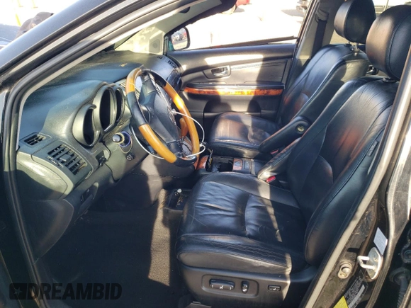 2006 Lexus RX 330 with VIN 2T2HA31U26C096680, listed as a Copart auction lot 57435695 with 228,457 mi miles and Salvage title. Bid and sale history available at DreamBid. Image 7.