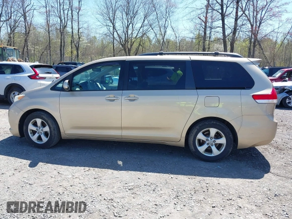 2012 Toyota Sienna LE AAS with VIN 5TDKK3DC9CS184090, listed as a IAAI auction lot 42123891 with 162,065 mi miles. Bid and sale history available at carsss.com. Image 14.