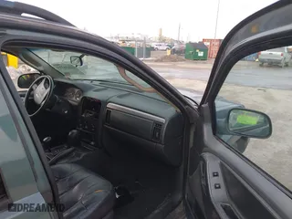 2003 Jeep Grand Cherokee Laredo with VIN 1J4GW48S93C583644, listed as a IAAI auction lot 41656314 with 256,653 mi miles. Bid and sale history available at carsss.com. Image 5.