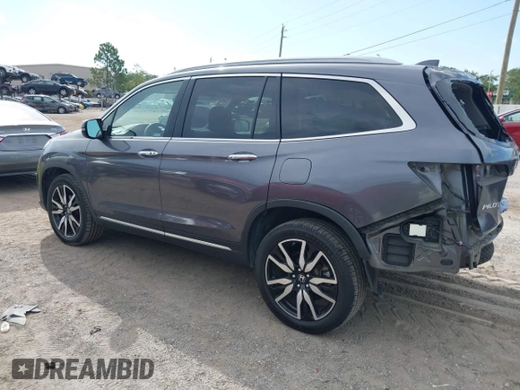 2022 Honda Pilot Elite with VIN 5FNYF6H04NB025212, listed as a IAAI auction lot 42430032 with 69,427 mi miles and . Bid and sale history available at DreamBid. Image 3.