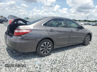 2015 Toyota Camry XLE with VIN 4T4BF1FK5FR461977, listed as a Copart auction lot 55680985 with 104,588 mi miles and Salvage Title. Bid and sale history available at DreamBid. Image 3.