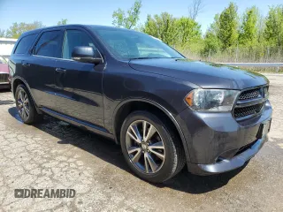 2013 Dodge Durango R/T with VIN 1C4SDJCT5DC698411, listed as a Copart auction lot 56406485 with 251,316 mi miles and Clean title. Bid and sale history available at DreamBid. Image 4.