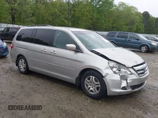 2007 Honda Odyssey EX with VIN 5FNRL38457B120170, listed as a IAAI auction lot 41960440 with 280,153 mi miles and . Bid and sale history available at DreamBid. Image 1.