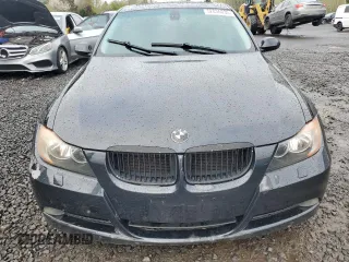 2007 BMW 3 Series 328xi with VIN WBAVC93517KX58143, listed as a Copart auction lot 52036035 with 161,954 mi miles and Salvage title. Bid and sale history available at DreamBid. Image 5.