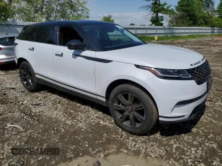 2020 Land Rover Range Rover Velar S z VIN SALYB2FV5LA293946, wystawiony jako Copart lot #55797125 z przebiegiem 46 564 mil mil oraz Szkoda całkowita • Salvage title. Historia ofert i sprzedaży dostępna na DreamBid. Obrazek 4.