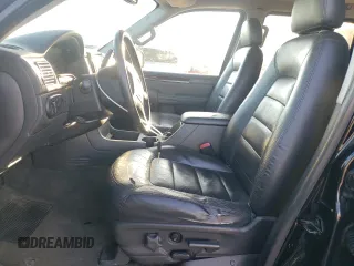 2003 Ford Explorer Limited с VIN 1FMDU75W83UA44235, выставлен на аукционе Copart как лот 82143684 с пробегом 215 664 миль миль и Списание • Salvage title. История ставок и продаж доступна на DreamBid. Изображение 7.