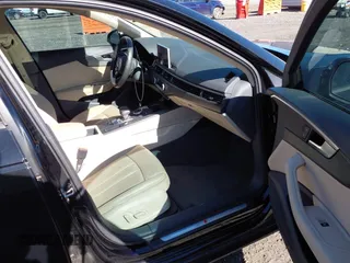 2018 Audi A4 Premium with VIN WAUKMAF41JN018702, listed as a IAAI auction lot 41770021 with 68,128 mi miles. Bid and sale history available at carsss.com. Image 5.
