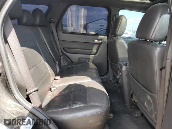 2010 Ford Escape Limited z VIN 1FMCU9EG2AKC38770, wystawiony jako Copart lot #55638905 z przebiegiem 186 209 mil mil oraz Czysty tytuł • Clean title. Historia ofert i sprzedaży dostępna na DreamBid. Obrazek 11.