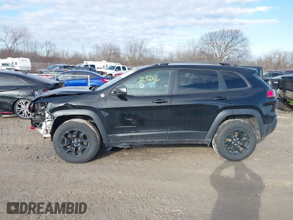 2020 Jeep Cherokee Trailhawk z VIN 1C4PJMBX5LD532516, wystawiony jako IAAI lot #41730502 z przebiegiem 85 543 mil mil oraz . Historia ofert i sprzedaży dostępna na DreamBid. Obrazek 14.