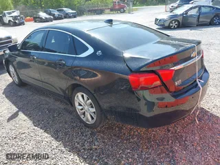 2016 Chevrolet Impala LT with VIN 2G1105SA1G9181772, listed as a IAAI auction lot 42005058 with 205,708 mi miles. Bid and sale history available at carsss.com. Image 3.