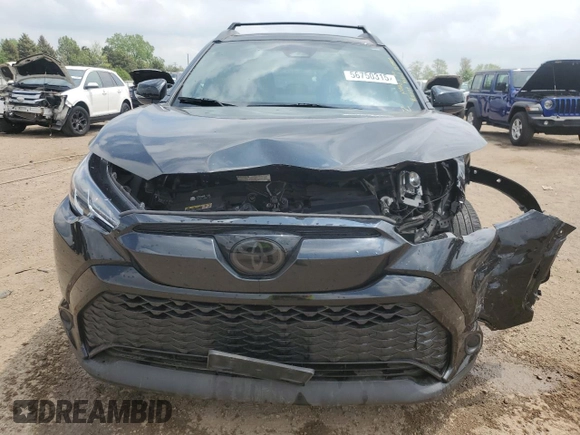 2023 Toyota Corolla Cross Hybrid S with VIN 7MUFBABG6PV014258, listed as a Copart auction lot 56750315 with 93,660 mi miles and Salvage title. Bid and sale history available at DreamBid. Image 5.