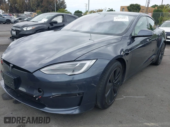 2021 Tesla Model S Long Range с VIN 5YJSA1E57MF441387, выставлен на аукционе IAAI как лот 42034307 с пробегом Не указан миль и . История ставок и продаж доступна на DreamBid. Изображение 2.