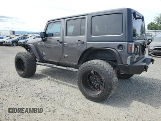 2016 Jeep Wrangler Unlimited Freedom with VIN 1C4BJWDG8GL300314, listed as a Copart auction lot 61044645 with 103,396 mi miles and Clean title. Bid and sale history available at DreamBid. Image 2.