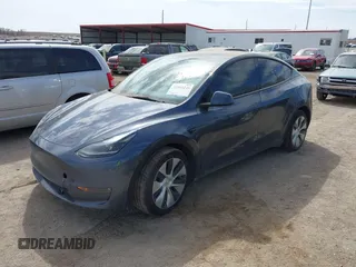 2022 Tesla Model Y Long Range with VIN 7SAYGDEE5NF534259, listed as a IAAI auction lot 41860246 with 24,513 mi miles and . Bid and sale history available at carsss.com. Image 19.