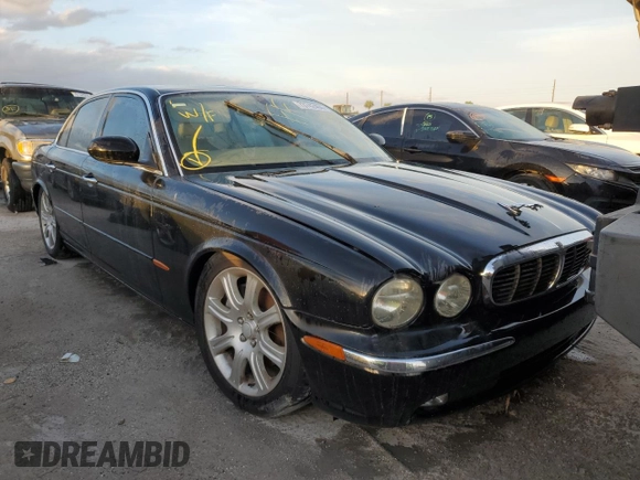2004 Jaguar XJ with VIN SAJWA71C04SG31354, listed as a Copart auction lot 73742404 with 0 mi miles and Non Repairable. Bid and sale history available at carsss.com. Image 4.