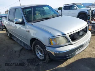 2001 Ford F-150 SuperCrew XLT with VIN 1FTRW07L11KB56494, listed as a IAAI auction lot 41623355 with 240,410 mi miles. Bid and sale history available at carsss.com. Image 1.