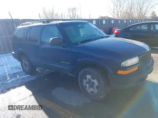 2002 Chevrolet Blazer LS z VIN 1GNDT13W82K183578, wystawiony jako IAAI lot #41349710 z przebiegiem Nie podano mil oraz . Historia ofert i sprzedaży dostępna na DreamBid. Obrazek 1.