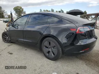 2023 Tesla Model 3 с VIN 5YJ3E1EA0PF706189, выставлен на аукционе Copart как лот 56756435 с пробегом 58 084 миль миль и Списание • Salvage title. История ставок и продаж доступна на DreamBid. Изображение 2.
