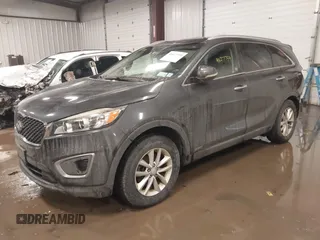 2016 Kia Sorento LX with VIN 5XYPGDA37GG016629, listed as a IAAI auction lot 41627759 with 80,558 mi miles and . Bid and sale history available at DreamBid. Image 2.