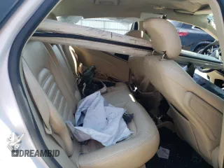 2015 Ford Fusion SE Hybrid z VIN 3FA6P0LU8FR105615, wystawiony jako Copart lot #61451155 z przebiegiem 106 778 mil mil oraz Szkoda całkowita • Salvage title. Historia ofert i sprzedaży dostępna na DreamBid. Obrazek 10.