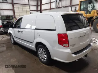 2014 Ram Cargo Van Tradesman with VIN 2C4JRGAG5ER341034, listed as a IAAI auction lot 41194609 with 156,772 mi miles. Bid and sale history available at carsss.com. Image 3.