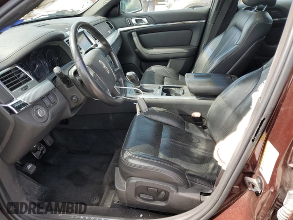 2012 Lincoln MKS EcoBoost with VIN 1LNHL9FT0CG800031, listed as a Copart auction lot 50520885 with 101,080 mi miles and Salvage title. Bid and sale history available at DreamBid. Image 7.