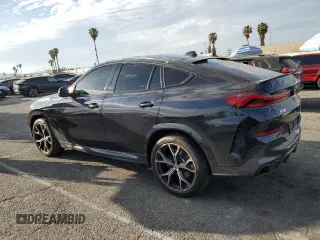 2021 BMW X6 xDrive40i with VIN 5UXCY6C04M9H02068, listed as a Copart auction lot 46938645 with 21,913 mi miles and Salvage Title. Bid and sale history available at carsss.com. Image 2.