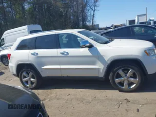 2011 Jeep Grand Cherokee Overland Summit with VIN 1J4RR6GT9BC546825, listed as a IAAI auction lot 42118789 with 123,449 mi miles. Bid and sale history available at carsss.com. Image 13.