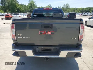 2015 GMC Canyon 4WD SLT z VIN 1GTG6CE30F1182562, wystawiony jako Copart lot #55382605 z przebiegiem 97 183 mil mil oraz Szkoda całkowita • Salvage title. Historia ofert i sprzedaży dostępna na DreamBid. Obrazek 6.