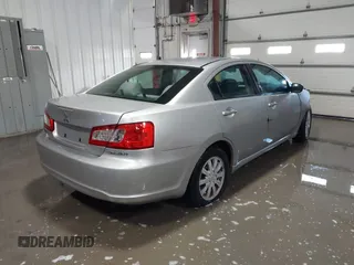 2011 Mitsubishi Galant FE z VIN 4A32B2FF6BE024171, wystawiony jako IAAI lot #41514790 z przebiegiem 118 221 mil mil oraz . Historia ofert i sprzedaży dostępna na DreamBid. Obrazek 4.