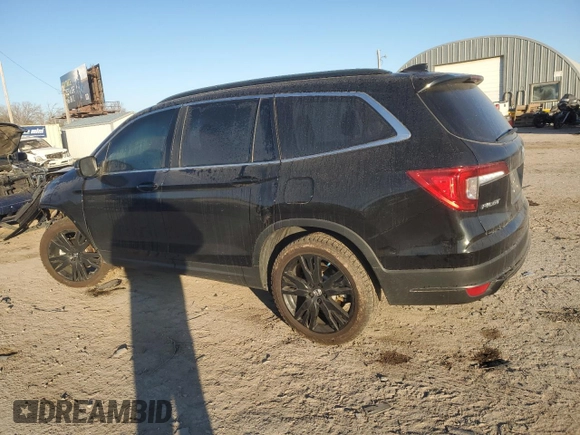 2021 Honda Pilot Special Edition with VIN 5FNYF6H25MB097665, listed as a Copart auction lot 82339324 with 64,509 mi miles and Salvage Title. Bid and sale history available at DreamBid. Image 2.