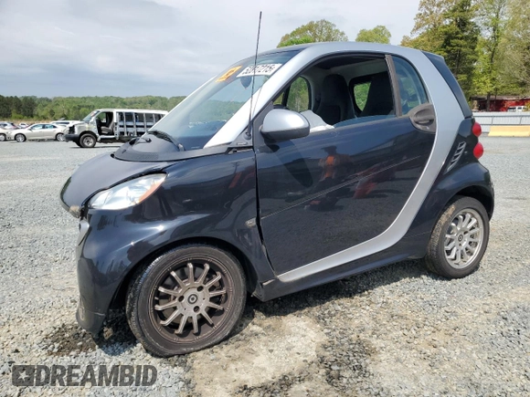 2013 Smart fortwo Pure with VIN WMEEJ3BA9DK670264, listed as a Copart auction lot 52817215 with 51,434 mi miles and Salvage Title. Bid and sale history available at DreamBid. Image 1.