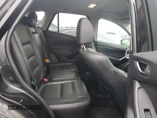 2013 Mazda CX-5 Grand Touring with VIN JM3KE4DE8D0161586, listed as a Copart auction lot 52641145 with 134,290 mi miles and Salvage Title. Bid and sale history available at carsss.com. Image 10.
