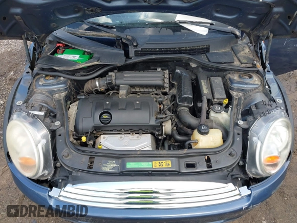 2009 MINI Hardtop with VIN WMWMF33509TU74290, listed as a IAAI auction lot 42538919 with 104,209 mi miles and . Bid and sale history available at DreamBid. Image 10.