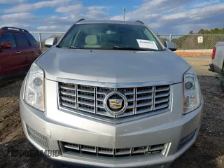2014 Cadillac SRX with VIN 3GYFNAE39ES688059, listed as a IAAI auction lot 41408062 with 192,770 mi miles and . Bid and sale history available at DreamBid. Image 12.