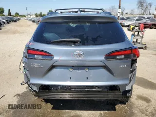 2023 Toyota Corolla Cross XLE z VIN 7MUDAAAG0PV063242, wystawiony jako Copart lot #52511585 z przebiegiem 10 695 mil mil oraz Szkody całkowita. Historia ofert i sprzedaży dostępna na DreamBid. Obrazek 6.
