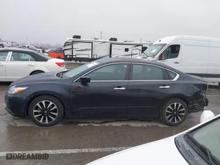 2018 Nissan Altima 2.5 SR with VIN 1N4AL3AP3JC165989, listed as a IAAI auction lot 41490589 with 84,879 mi miles. Bid and sale history available at carsss.com. Image 14.
