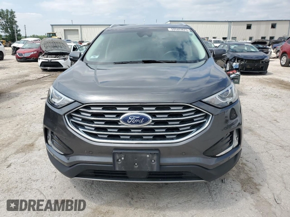 2020 Ford Edge Titanium с VIN 2FMPK4K97LBA11619, выставлен на аукционе Copart как лот 59505825 с пробегом 87 506 миль миль и Списание • Salvage title. История ставок и продаж доступна на DreamBid. Изображение 5.