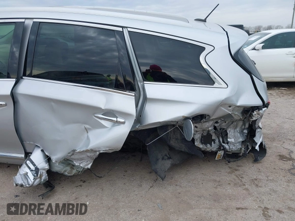 2013 Infiniti JX35 with VIN 5N1AL0MM8DC352896, listed as a IAAI auction lot 41561639 with 158,533 mi miles and . Bid and sale history available at DreamBid. Image 6.