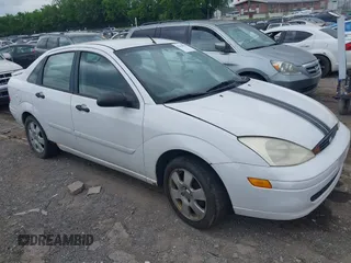 2000 Ford Focus SE with VIN 1FAFP3430YW260053, listed as a IAAI auction lot 42166070 with 114,761 mi miles and . Bid and sale history available at carsss.com. Image 1.