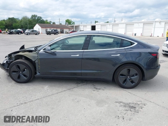 2018 Tesla Model 3 Long Range Battery with VIN 5YJ3E1EB3JF119498, listed as a IAAI auction lot 41966643 with 45,566 mi miles and . Bid and sale history available at DreamBid. Image 15.