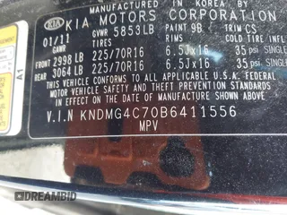 2011 Kia Sedona LX with VIN KNDMG4C70B6411556, listed as a IAAI auction lot 41768777 with 124,180 mi miles. Bid and sale history available at carsss.com. Image 9.