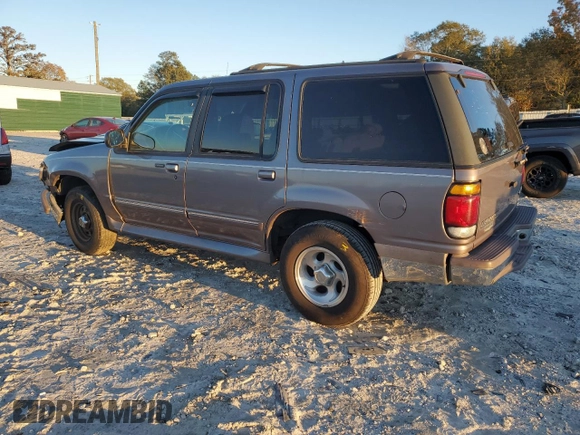 1997 Ford Explorer XL with VIN 1FMDU34XXVUC61582, listed as a Copart auction lot 81957344 with 153,852 mi miles and Salvage title. Bid and sale history available at DreamBid. Image 2.