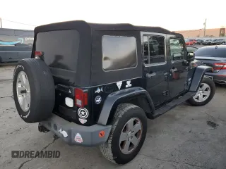 2007 Jeep Wrangler Unlimited Sahara with VIN 1J8GA59117L188579, listed as a Copart auction lot 79823624 with 68,322 mi miles and Clean Title. Bid and sale history available at carsss.com. Image 3.