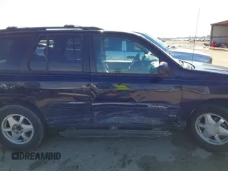 2003 GMC Envoy SLE with VIN 1GKDS13S732134354, listed as a IAAI auction lot 41305506 with 221,733 mi miles. Bid and sale history available at carsss.com. Image 13.