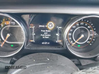 2023 Jeep Wrangler Sport S with VIN 1C4HJXDN6PW592915, listed as a IAAI auction lot 41662077 with 43,129 mi miles and . Bid and sale history available at DreamBid. Image 7.