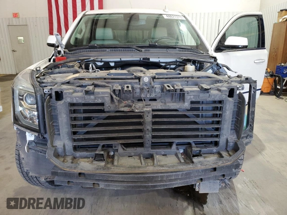 2020 GMC Yukon Denali with VIN 1GKS1CKJ3LR107335, listed as a Copart auction lot 49971315 with 139,967 mi miles and Salvage Title. Bid and sale history available at carsss.com. Image 5.