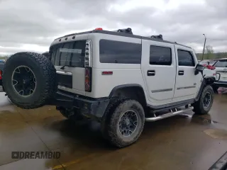 2003 Hummer H2 with VIN 5GRGN23U43H128269, listed as a Copart auction lot 47992444 with 153,360 mi miles and Salvage Title. Bid and sale history available at carsss.com. Image 3.