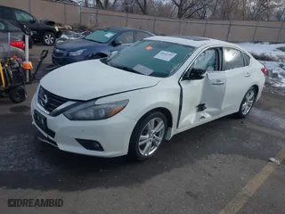 2016 Nissan Altima 3.5 SL with VIN 1N4BL3AP5GC189014, listed as a IAAI auction lot 41612301 with 99,429 mi miles. Bid and sale history available at carsss.com. Image 16.